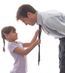 Professional straightening his tie