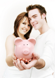 A Couple With Their Piggybank