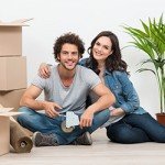 a happy couple moving to their new home