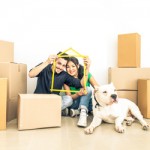 Young smiling couple who just bought a home