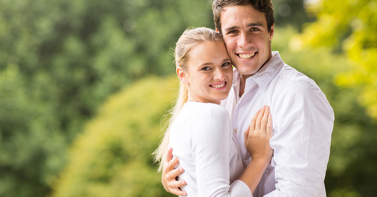 A happy couple smiling - social
