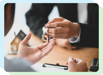 hand giving keys to someone with a default